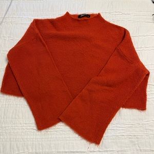 orange sweater